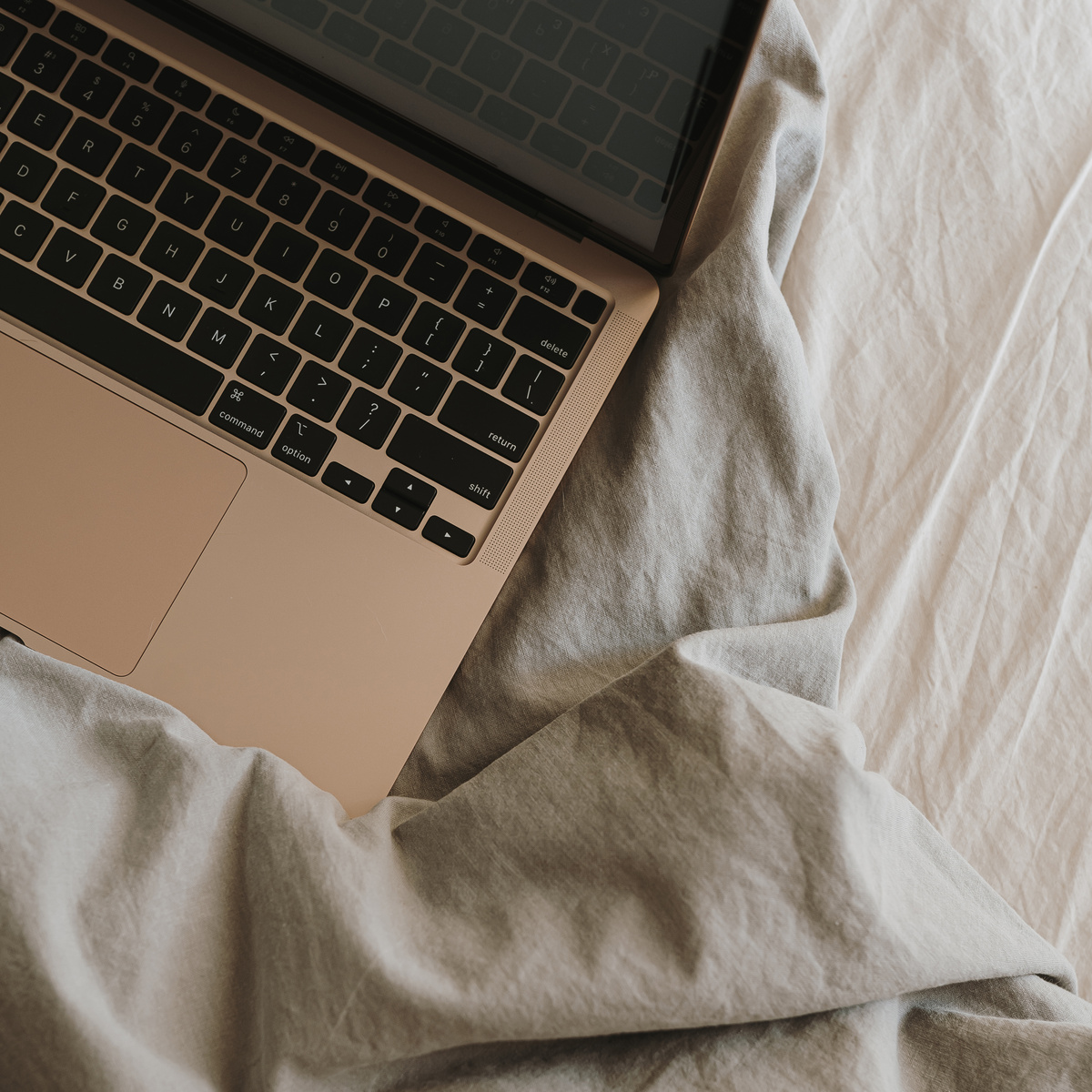 Laptop on a Bed